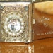 Coro Pegasus book photo LOCKET with faceted glass jewel and faux pearls patended fold out design