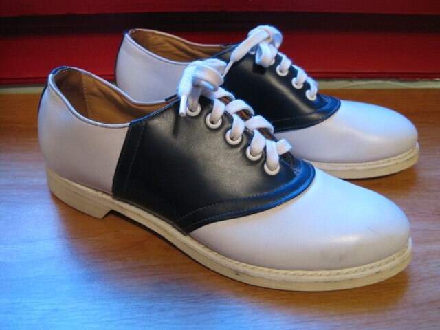 1940s-1950s classic navy blue and white saddle shoes
