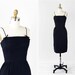1950s dress / 50s dress / Mad Men Black Eyelet Wiggle Dress with Bows by Helen Whiting