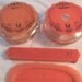 vintage vanity set, 2 glass containers, salmon color