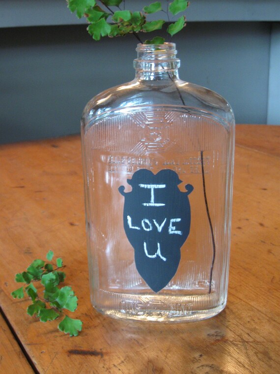 Decorative chalkboard on Vintage glass bottle vase for