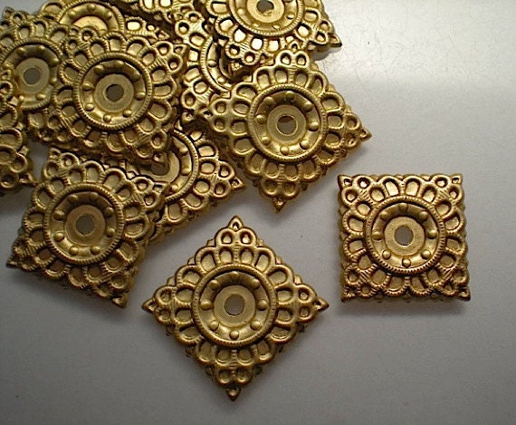 12 brass mirror rosettes No. 6