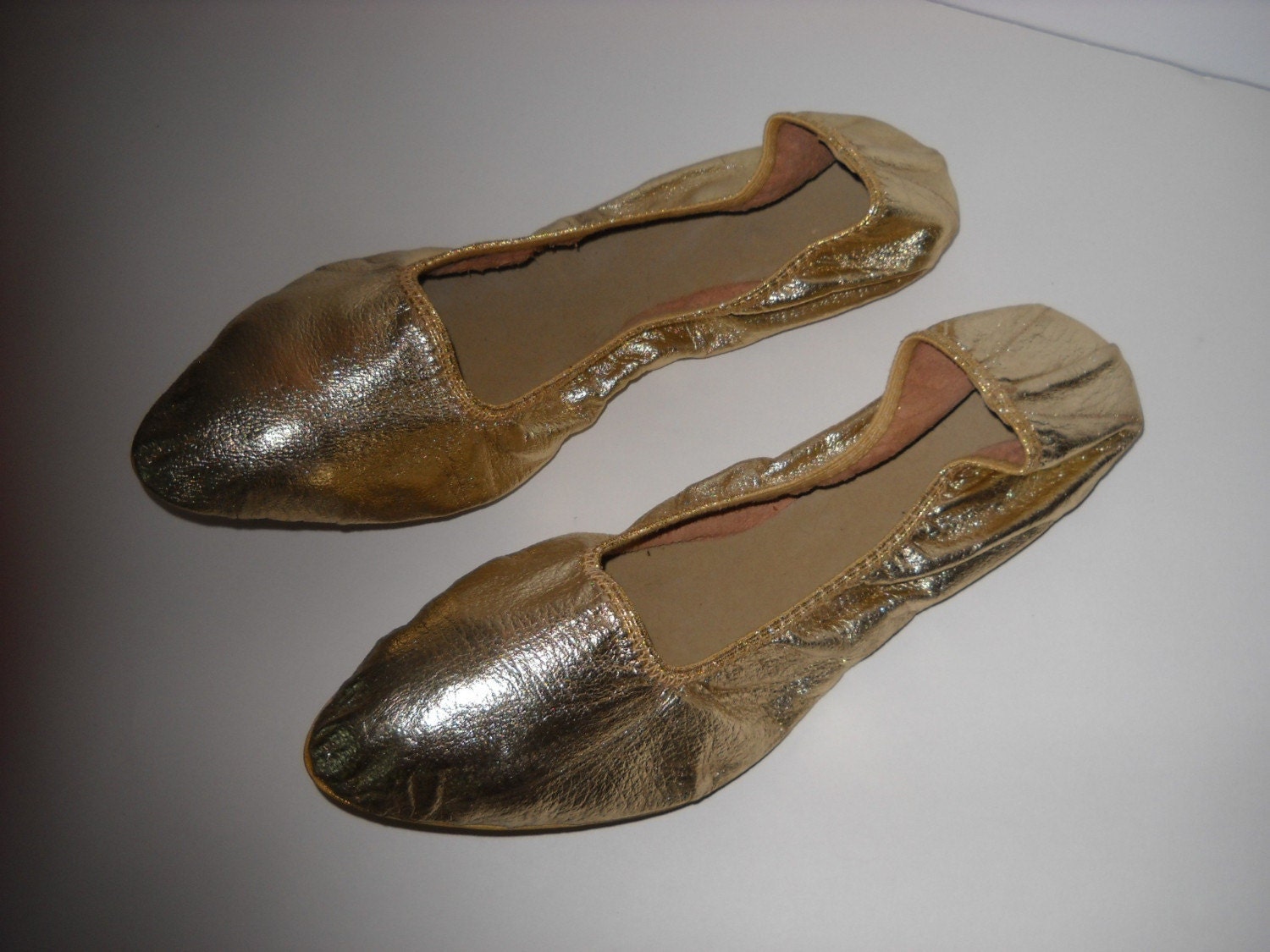 gold ballet slippers