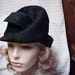 Reserved for Tsangse--Imported black fur hat made in Austria size 22 1/2 inches