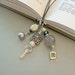 Three Strand Bookmark - Art Deco Grays, Silver, Pearl and Leather Cord Bookmark