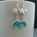 Azure Blue Sea Silver Framed Blue Glass Dangle and Tryptic Leaf Motif Earrings