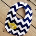 Navy chevron baby bib with citron birdie