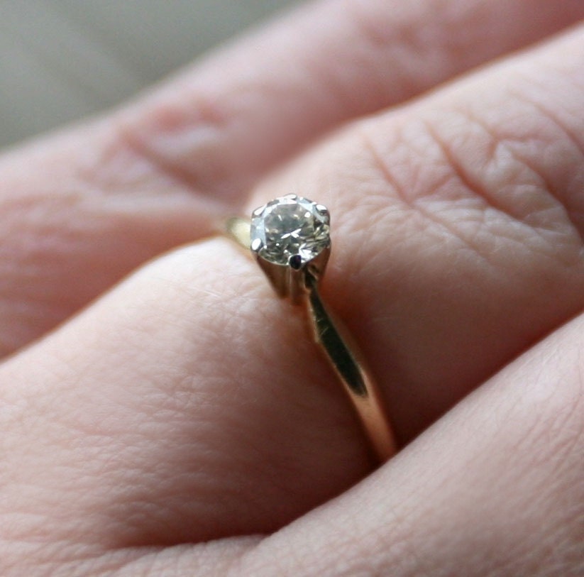 1/4 carat diamond solitaire engagement ring by ceasefireheirlooms