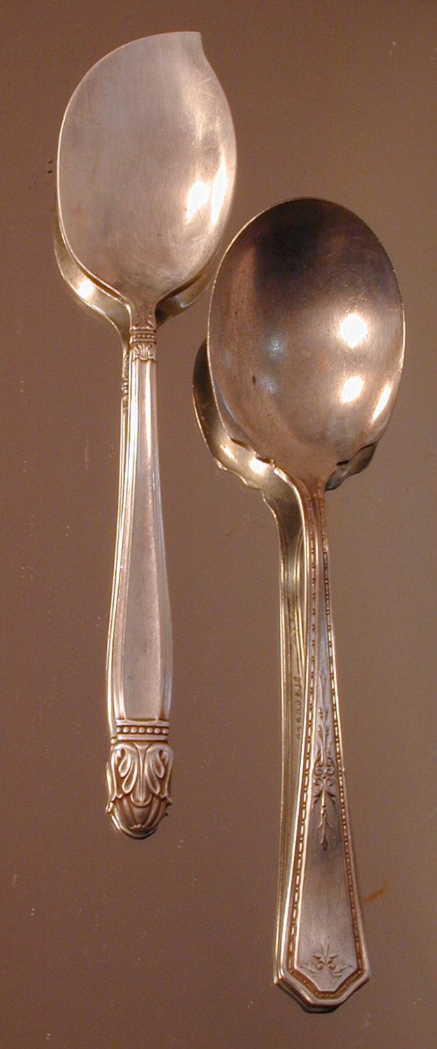 Pair of Jelly Spoons by Holmes and Edwards and SL GHR Co.