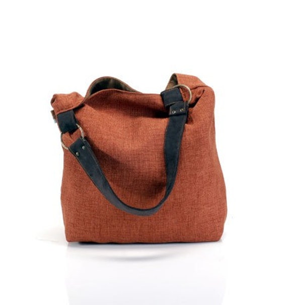 orange over the shoulder bag