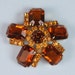 Vintage Rhinestone Brooch Topaz Glass Pinwheel Design