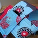 Camera Strap Reversible Lens Cap Pocket Blue and Coral Woodland Bloom