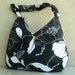 Slouch Hobo Handbag Handmade Purse in Black and White Flowers (no4) A zippered hobo bag constructed of upholstery weight outdoor fabric.