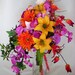 Tropical Orchid Bouquet Cascade fuschia Orchids Orange Yellow Lillies destination weddings