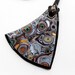 Picasso Glow in the Dark Polymer clay Pendant