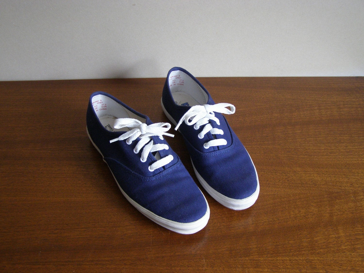 red white and navy blue sneakers