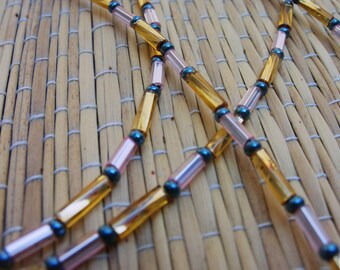 beaded lanyard/ID badge holder in pink, blue, gold
