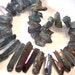 Natural rock crystal points druzy type coated purple gray