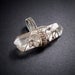 Double terminated twinned quartz crystal wire wrapped pendant