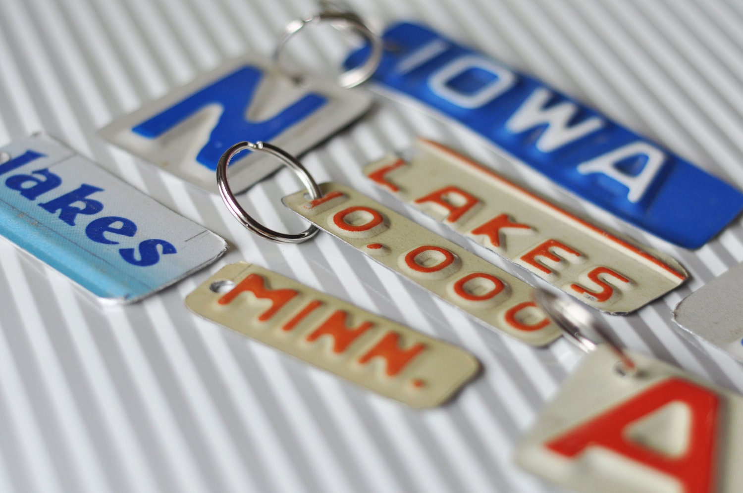 UPcycled license plate keychains. letters and numbers