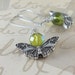 Silver Butterfly and Shimmering Green Beaded Earrings