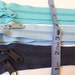 Seven blue 9 inch YKK Hand bag zippers with extra long pull
