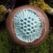 Brown Ceramic Flower Pod Wall Hanging with Holey Turquoise Green Center