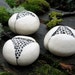 White Ceramic Pod Trio with Black and White Centers Wall Hanging