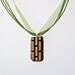 Black and gold necklace with green ribbon adjustable choker