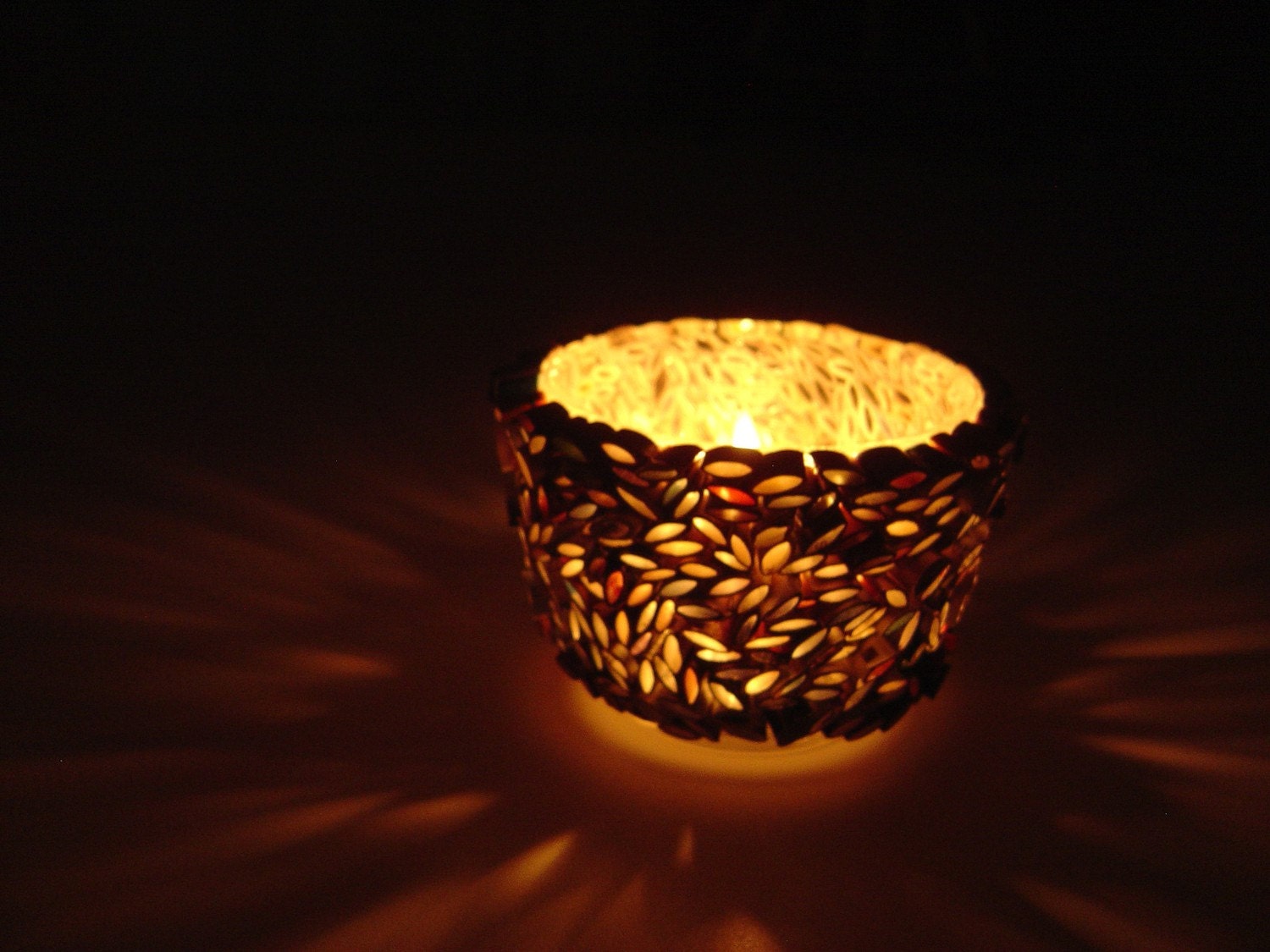 votive candle holder made with recycled magazines color