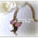 Humming Spring Necklace made with humming bird charm, swarovski heart crystal, swarovski pearl, flower etc.