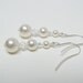 Swarovski white pearl earrings crystal pearl dangle earrings graduated pearl size with ab finish crystals on surgical steel earwires