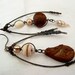 Silentium asymetrical miss matched cream rusted assemblage tribal sci-fi dangle earrings