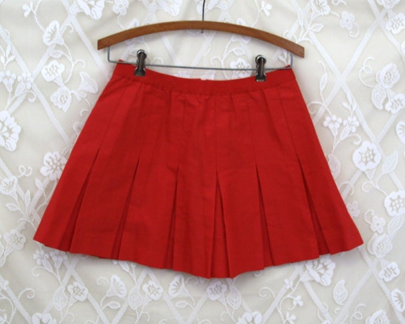 Cute little red pleated skirt cheer leader tennis style