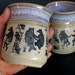 A Pair of Dancing Bear and Blueberry Stoneware Cups on SALE