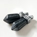 Black Drop Beads with Incised White Decoration and Metallic Silver Caps