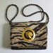 Fabulous Leopard/Jaguar Print Bag.Chain Strap with Tiger Medalion
