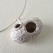 Silver cocoon pendant