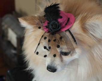 Cute hot pink color mini hat with feather and flowers for dog or cat