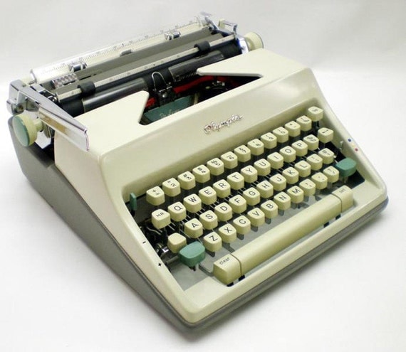 1960s White Olympia Manual Typewriter w/ Case Script