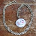 floral guilloche / a pendant necklace