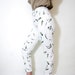 Vintage pants. white wheat print skinny jeans. size S