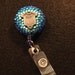 Pretty Blue Onesie Badge Holder