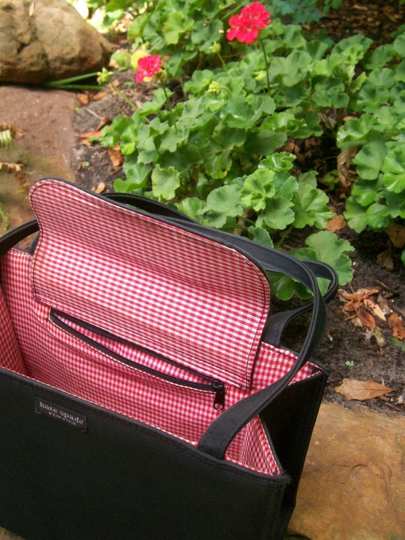 black kate spade purse pink inside