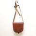 30% OFF.....60s 70s small tooled leather SADDLE bag