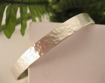 Hammered Sterling Silver Cuff Bracelet. Fits 6.5 to 7 inch wrist. Free shipping to US locations, reduced rates to all other countries.