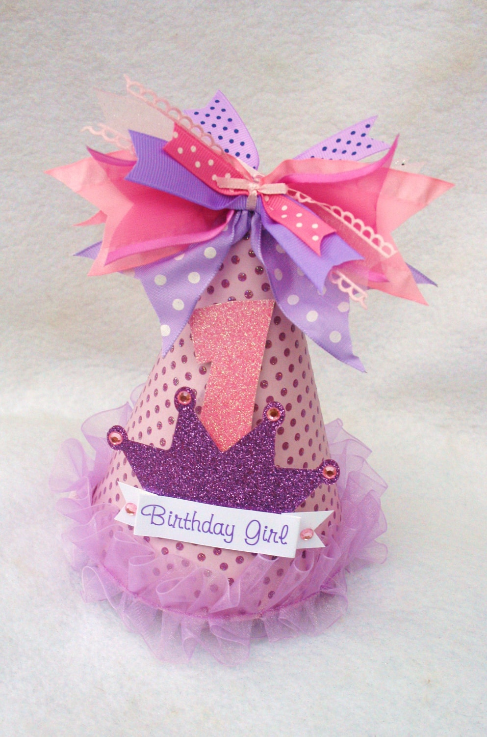 sparkly purple and pink princess party hat with polka dots