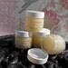 1oz jar of Pucker Polish Lip Sugar Scrub Cosmopolitan lip-tini