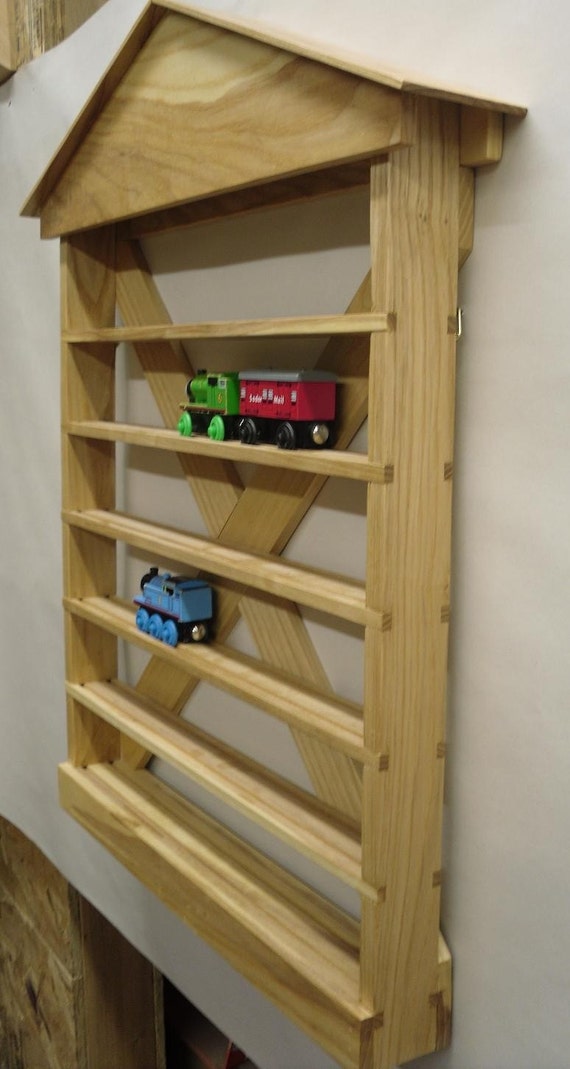 Wooden wall mounted train shelf