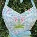 Handmade apron dragonflies, gardening tools